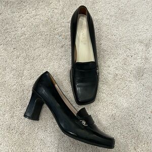 Great condition Versace black leather pumps size 7 1/2 with silver buckle
